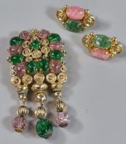 Christian Dior, gilt metal brooch with green and pink coloured stones and a pair of matching clip on
