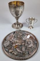 Silver miniature two handled trophy cup. 0.7 troy oz approx. together with a white metal goblet. 8.3