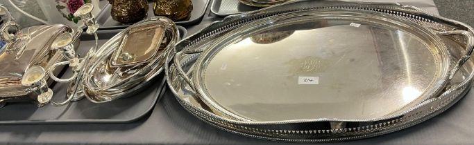 Quantity of silver plated items to include: two oval salvers, entre dishes, candelabrum etc. (2) (