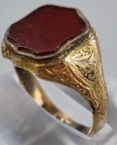 9ct gold shield shaped carnelian seal ring. 4.7g approx. size Q1/2. (B.P. 21% + VAT)