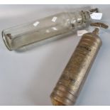 Vintage glass bottle marked 'Essolube' together with a vintage 'Auto Minimax' handpump type 'D'