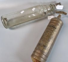 Vintage glass bottle marked 'Essolube' together with a vintage 'Auto Minimax' handpump type 'D'