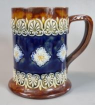 Royal Doulton stoneware 1475 tankard, decorated with relief moulded repeating flowerhead and foliate