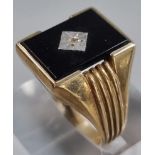 9ct gold black onyx signet ring with tiny diamond chip. 5.4g approx. Size S. (B.P. 21% + VAT)