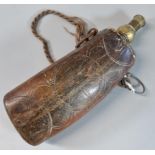 19th century, probably Eastern, wooden powder flask with engraved geometric decoration and brass