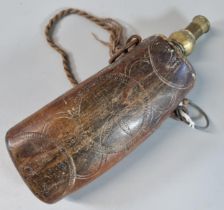 19th century, probably Eastern, wooden powder flask with engraved geometric decoration and brass