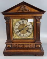 Early 20th century carved architectural design two train mantle clock with silver chapter ring,