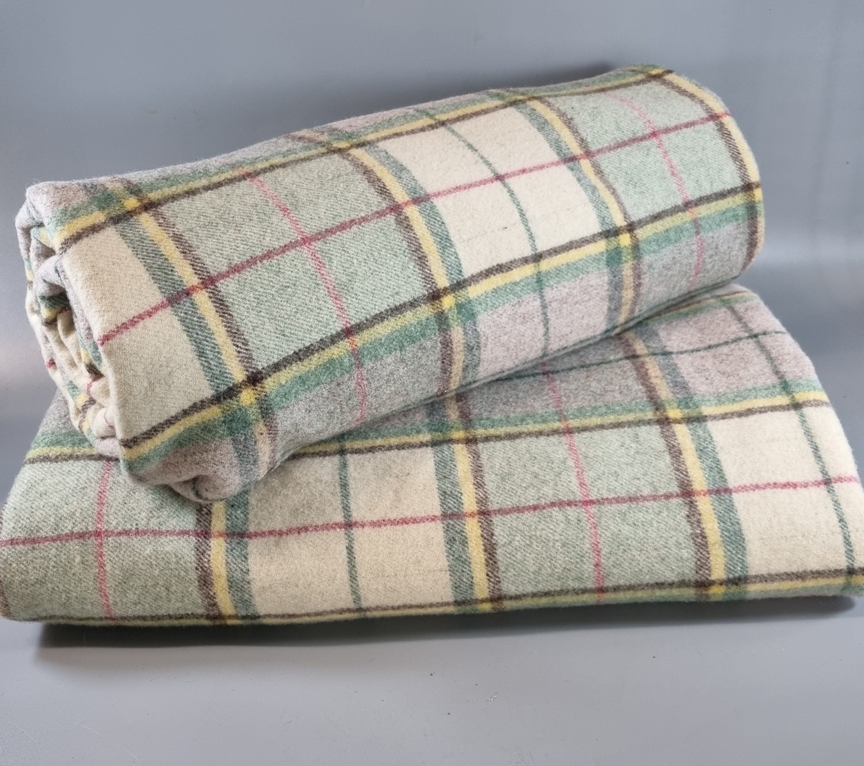 Two similar multi-coloured checked Welsh blankets. (2) (B.P. 21% + VAT)