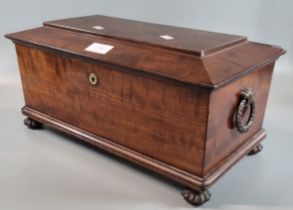 19th century mahogany sarcophagus shaped tea caddy, the interior revealing two sections with ceramic