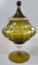 Mid century yellow glass bowl and cover on a fluted pedestal and circular base. (B.P. 21% + VAT)