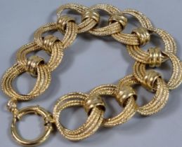 9ct gold contemporary weave and hoop design bracelet. 11.5g approx. 18cm long approx. (B.P. 21% +