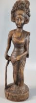 Carved Balinese hardwood figurine of a goddess. 45cm high approx. (B.P. 21% + VAT)