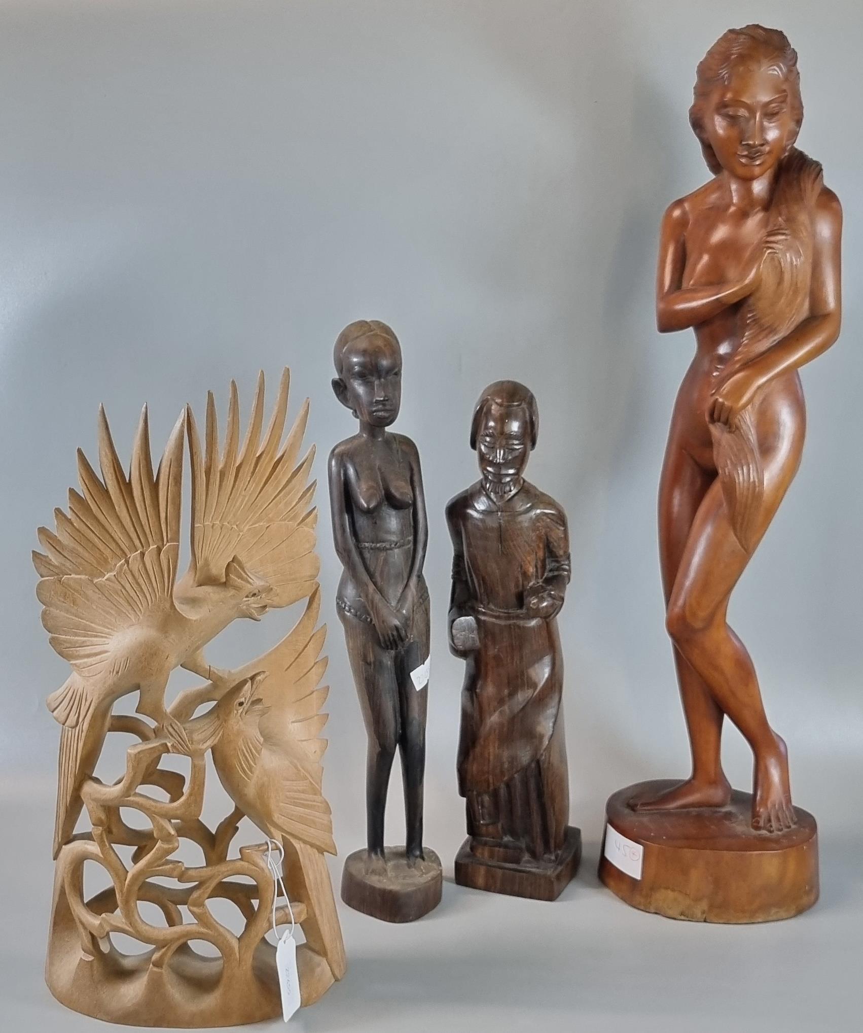 Collection of Balinese/Indonesian hardwood sculptures to include: nude and other figurines and a