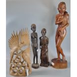 Collection of Balinese/Indonesian hardwood sculptures to include: nude and other figurines and a