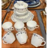 Shelley bone china tea set in Art Deco design with sprigged and chequered banding comprising: six