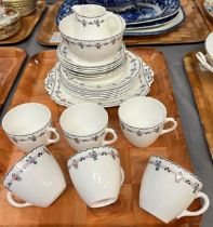 Shelley bone china tea set in Art Deco design with sprigged and chequered banding comprising: six