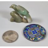 Chinese silver Fat Man Dollar coin together with an enameled circular Chinese tablet with symbol