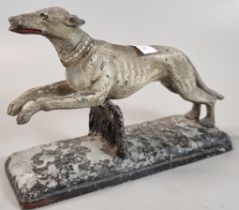Vintage spelter study of a Greyhound jumping a fence. (B.P. 21% + VAT)
