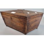 19th century mahogany sarcophagus work/jewellery box with herringbone inlay, raised on pad feet. (