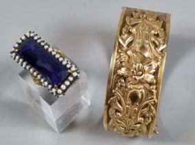Silver gilt Georgian style dress ring together with an ornate gold plated relief floral and