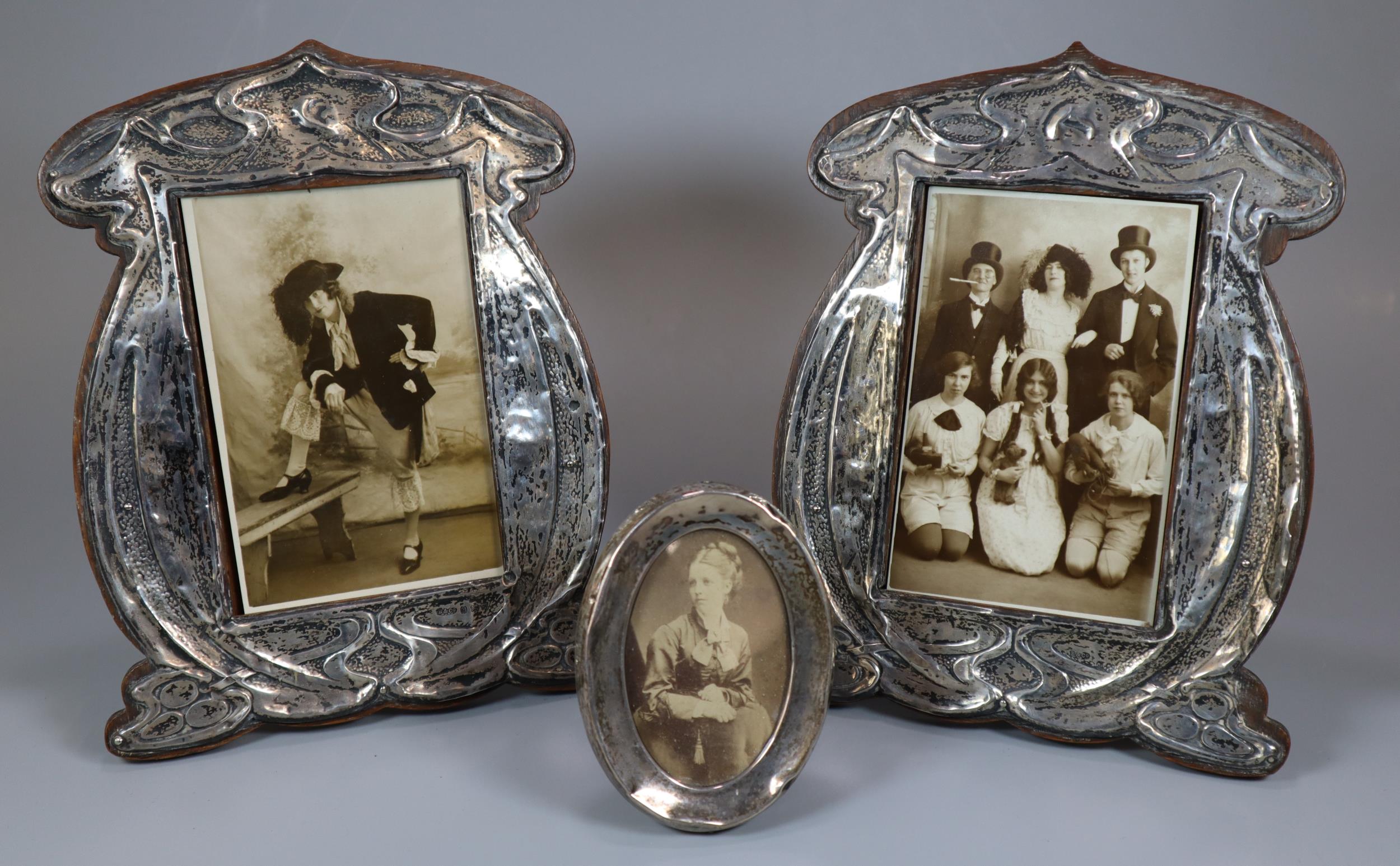 Pair of silver Art Nouveau organic design easel picture frames by B & Co., together with a smaller