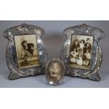 Pair of silver Art Nouveau organic design easel picture frames by B & Co., together with a smaller
