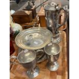 Group of ecclesiastical silver plated items to include: communion wine flagon, a paten, two