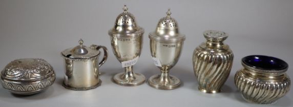 Collection of 19th century and other silver condiments together with a silver circular snuff box. 10