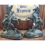 Pair of early 20th century French spelter Marley Horses with Grooms on naturalistic bases. 52cm high