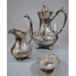 Victorian silver plated repoussé coffee pot and matching cream jug together with a silver repoussé