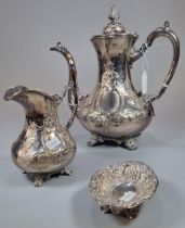 Victorian silver plated repoussé coffee pot and matching cream jug together with a silver repoussé