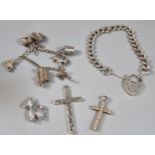 Collection of silver charm bracelets with charms together with a curb link bracelet and heart shaped