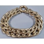9ct gold multi-link curb bracelet. 20.8g approx. 18.5cm long approx. (B.P. 21% + VAT)