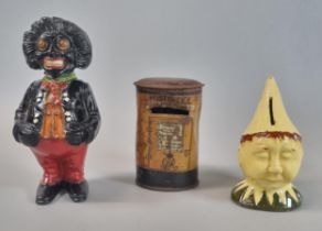 Group of moneyboxes to include: cast metal standing golly, tinplate George V letterbox and slip