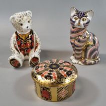 Two Royal Crown derby paperweights, one with gold stopper, to include: 'Debonaire Bear' and a seated