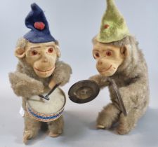 Two clockwork automaton musical monkey figures, drummer and cymbal player. 20cm high approx. (2) (