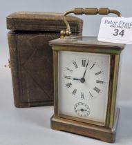 Early 20th century French brass carriage clock with alarm movement and full depth Roman face,