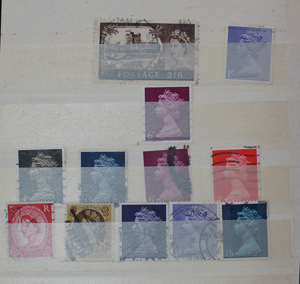 A book with a small collection of stamps. - Image 7 of 11