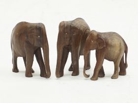 Carved hardwood Asian elephants