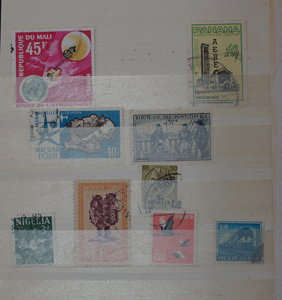 A book with a small collection of stamps. - Image 3 of 11
