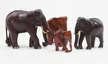 Carved wood Asian elephants
