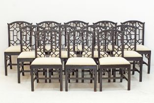 A set of 12 Chippendale style dining chairs