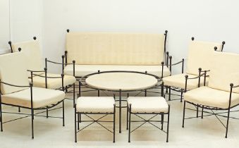 A suite of wrought iron garden furniture
