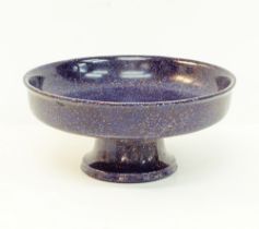 A blue speckled ceramic footed fruit bowl