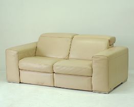 A Natuzzi leather two seat recliner sofa
