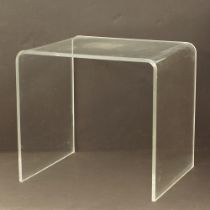 A Perspex side table in Π shape