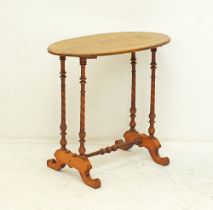 A Victorian carved walnut table