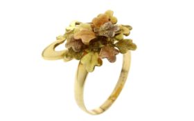 Ring 6.11g 750/- Gelbgold. Weissgold und Rotgold. Ringgroesse ca. 60