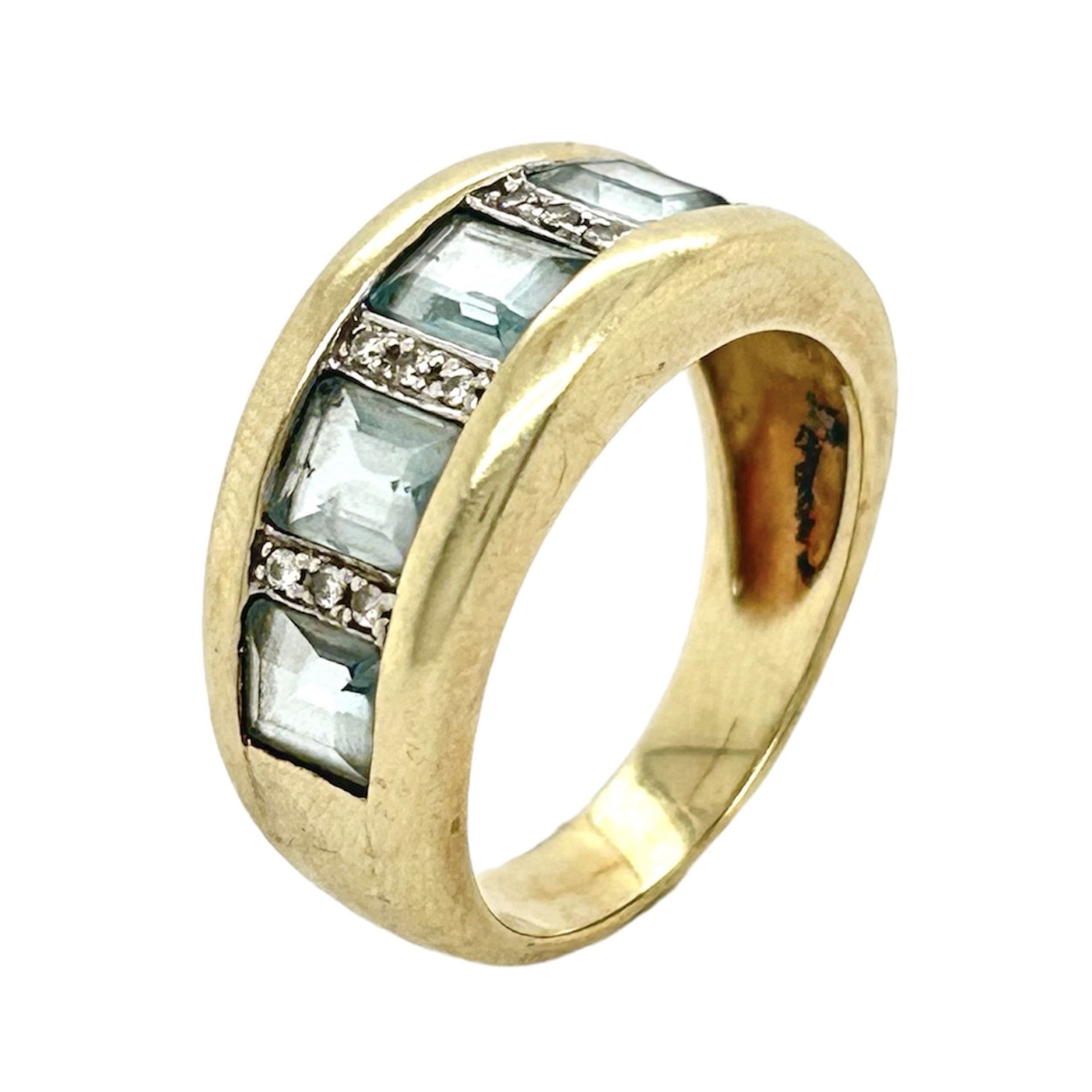 Ring 7,23g 585/- Gelbgold und Weissgold mit 12 Diamanten zus. ca. 0,12 ct. und Topas, Ringgroesse ca