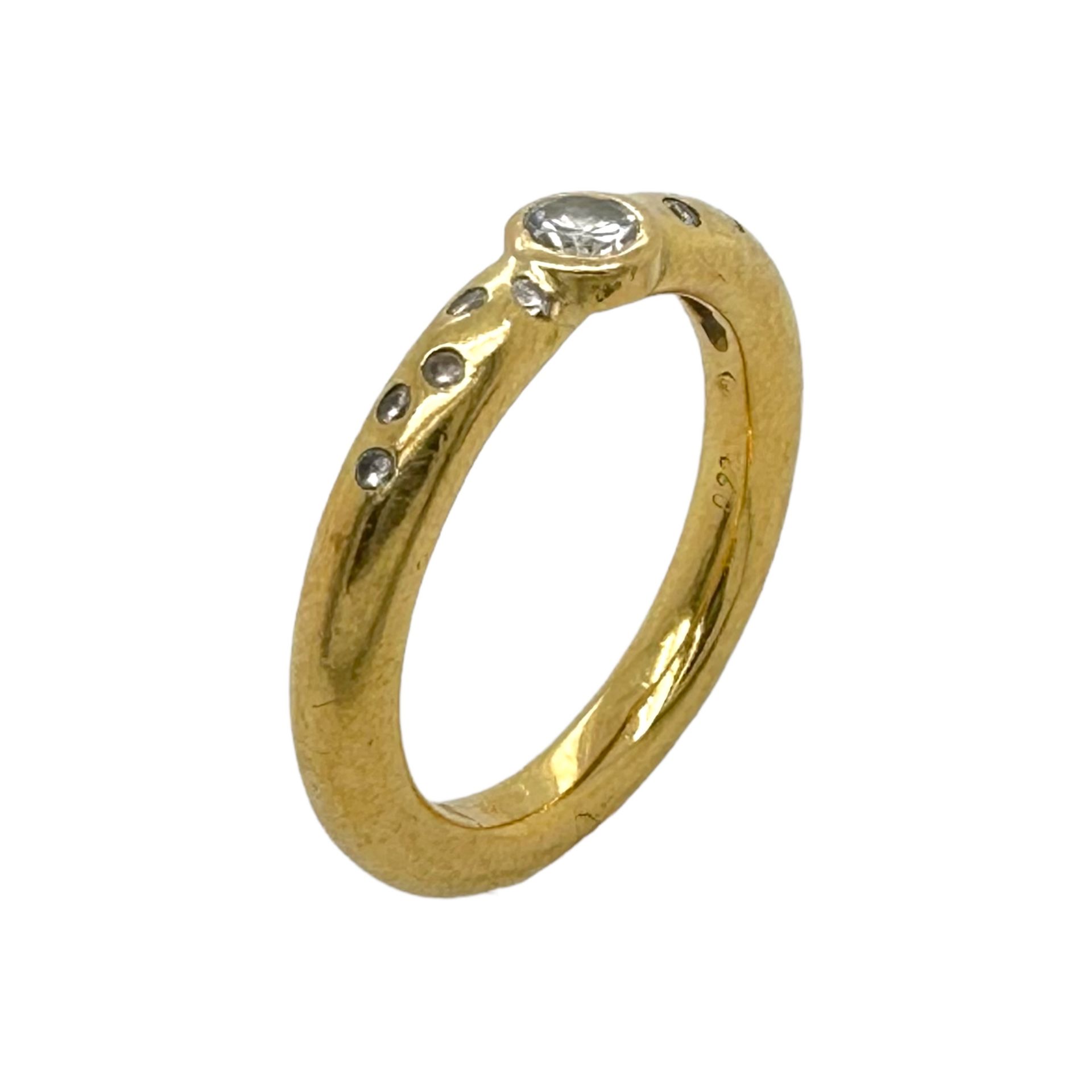 Ring 6,37g 750/- Gelbgold mit Diamant ca. 0,15 ct. und 10 Diamanten zus. ca. 0,10 ct., Ringgroesse .